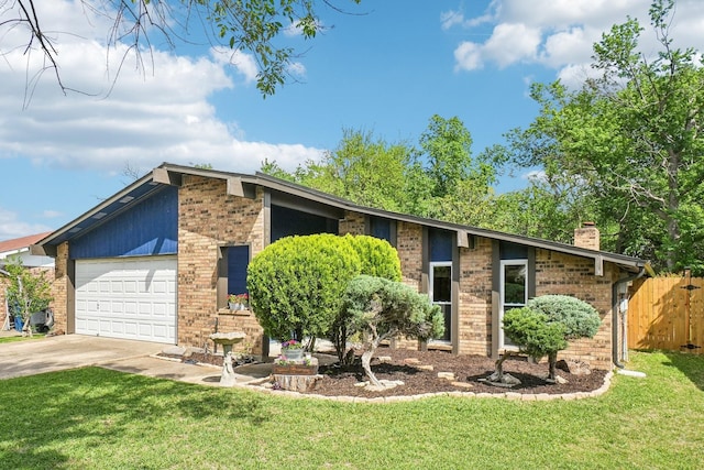 mid-century inspired home with a front yard, brick siding, concrete driveway, an attached garage, and fence