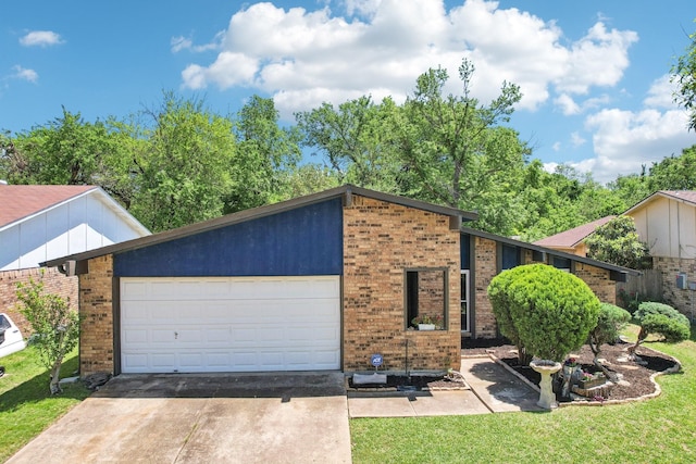 view of front of property featuring a garage, brick siding, and concrete driveway