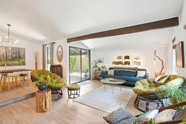 living room featuring wood finished floors, lofted ceiling with beams, and a chandelier
