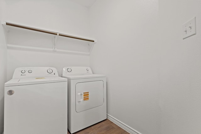 2433 Dahlia Dr, Fort Worth, TX 76123 - washroom featuring washer and dryer, dark wood-style flooring, and baseboards