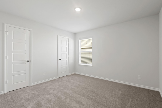 2433 Dahlia Dr, Fort Worth, TX 76123 - unfurnished bedroom with carpet flooring and baseboards