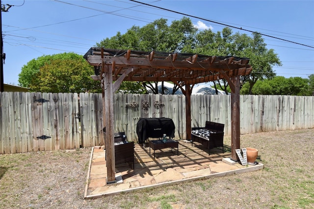 view of patio featuring a fenced backyard, a pergola, and a grill