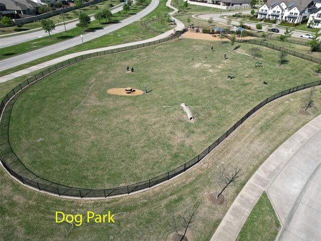 birds eye view of property with a residential view