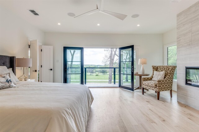 bedroom with light wood-style flooring, visible vents, recessed lighting, access to outside, and ceiling fan