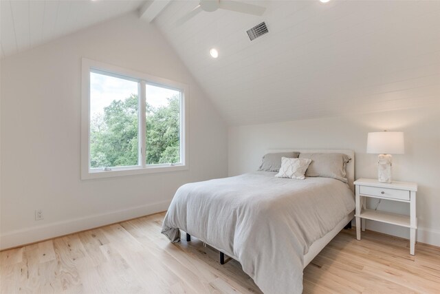 bedroom featuring baseboards, visible vents, and light wood-style flooring