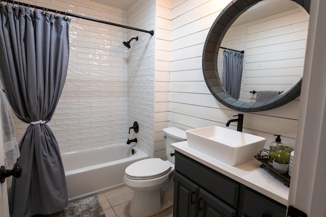 810 Clear Water Trl, Holly Lake Ranch, TX 75765 - full bathroom with tile patterned floors, shower / bath combination with curtain, toilet, vanity, and wooden walls