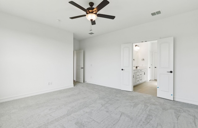 11205 Boyne Ave, Fort Worth, TX 76052 - unfurnished bedroom with light carpet, baseboards, and a ceiling fan