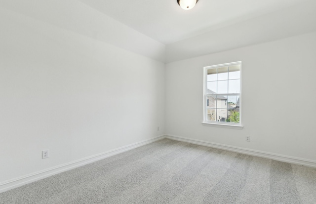 11205 Boyne Ave, Fort Worth, TX 76052 - spare room with carpet flooring, baseboards, and lofted ceiling