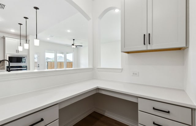 11205 Boyne Ave, Fort Worth, TX 76052 - unfurnished office featuring arched walkways, recessed lighting, dark wood-style flooring, and a ceiling fan