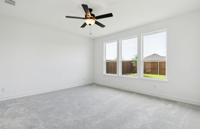 11205 Boyne Ave, Fort Worth, TX 76052 - empty room featuring carpet, baseboards, and ceiling fan
