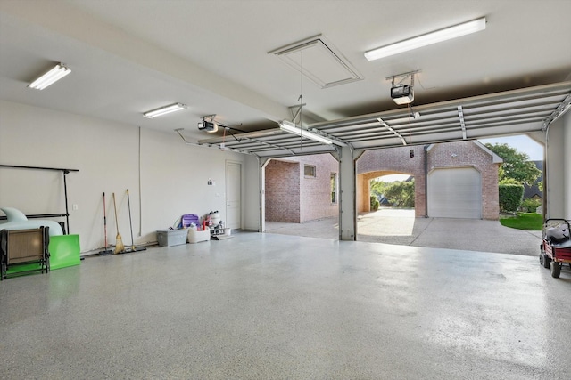 garage featuring a garage door opener