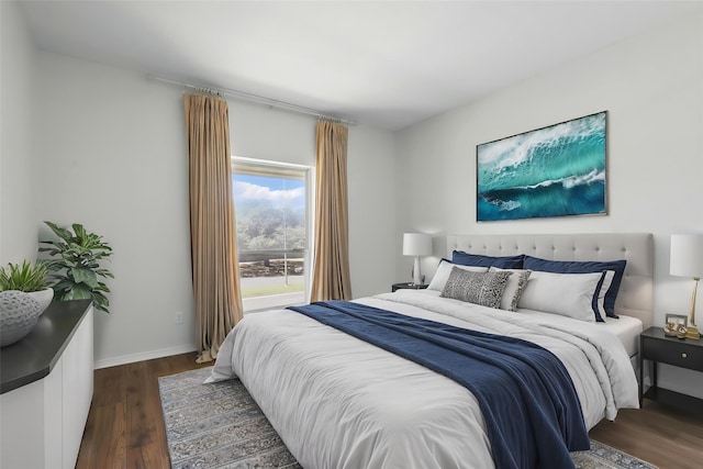 4320 Bellaire Dr S Unit 206W, Fort Worth, TX 76109 - bedroom with baseboards and dark wood-style floors