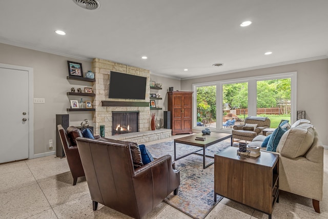 living room featuring baseboards, ornamental molding, and light speckled floor