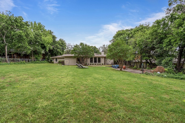 view of yard with fence