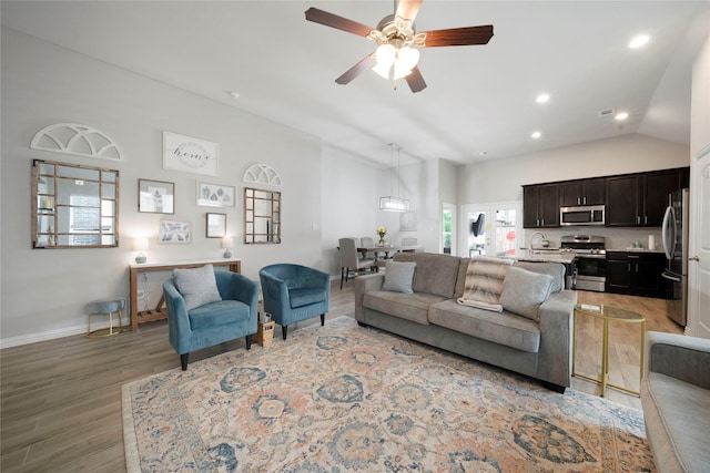 616 Chippewa Way, Aubrey, TX 76227 - living room featuring light wood finished floors, vaulted ceiling, ceiling fan, baseboards, and recessed lighting