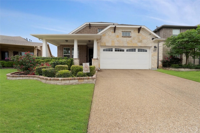 616 Chippewa Way, Aubrey, TX 76227 - craftsman inspired home featuring a garage, a front lawn, driveway, stone siding, and brick siding