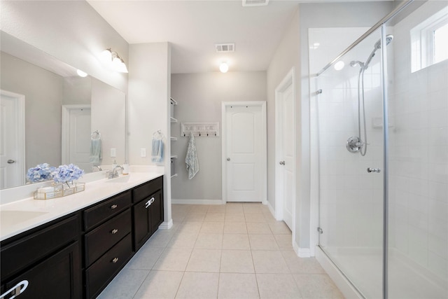 616 Chippewa Way, Aubrey, TX 76227 - bathroom with a shower stall, tile patterned flooring, double vanity, and baseboards