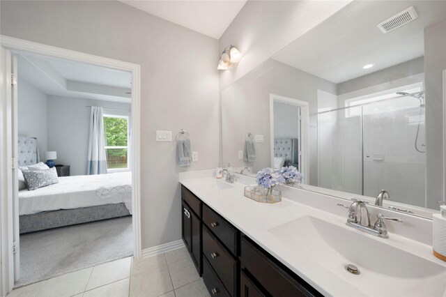 616 Chippewa Way, Aubrey, TX 76227 - bathroom with ensuite bath, a stall shower, tile patterned flooring, and double vanity