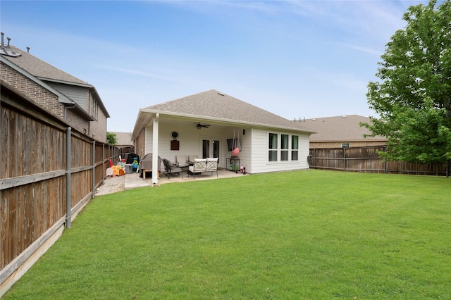 616 Chippewa Way, Aubrey, TX 76227 - back of house with a ceiling fan, an outdoor living space, a patio area, and a shingled roof