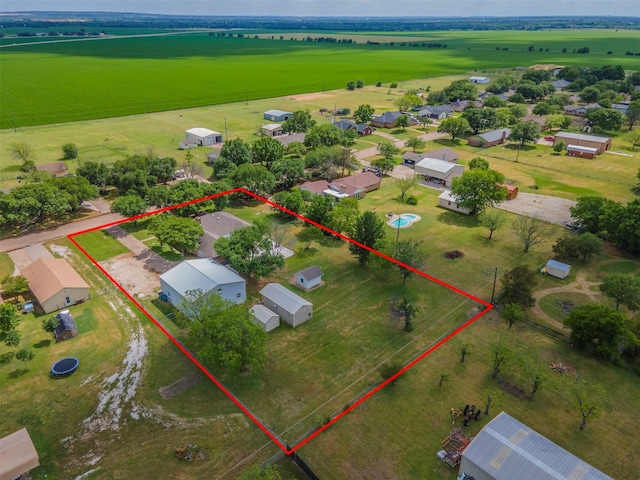 birds eye view of property with a residential view and a rural view