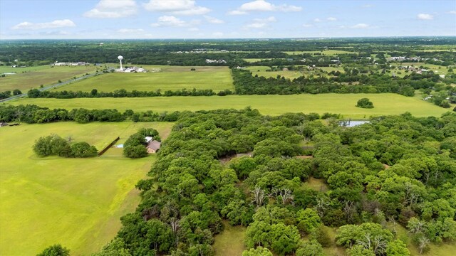 birds eye view of property featuring a rural view