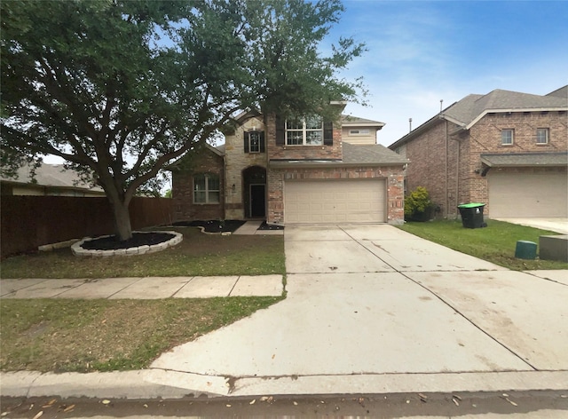 1005 Lake Hollow Dr, Little Elm, TX 75068 - traditional-style home featuring brick siding, fence, a garage, driveway, and a front yard