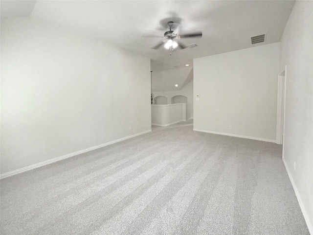 1005 Lake Hollow Dr, Little Elm, TX 75068 - spare room with light carpet, a ceiling fan, visible vents, and baseboards