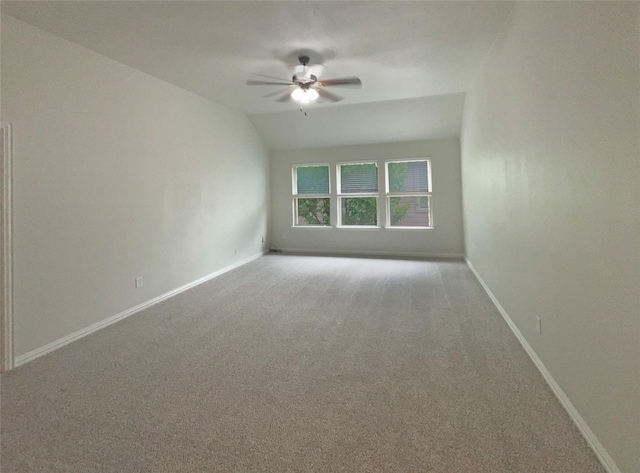 1005 Lake Hollow Dr, Little Elm, TX 75068 - unfurnished room with vaulted ceiling, baseboards, carpet floors, and ceiling fan