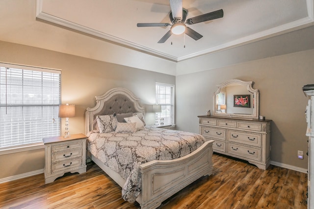 1944 Nottingham Dr, Kaufman, TX 75142 - bedroom with ceiling fan, baseboards, wood finished floors, and a tray ceiling