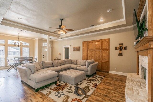 1944 Nottingham Dr, Kaufman, TX 75142 - living area with a tray ceiling, baseboards, visible vents, and dark wood-style floors