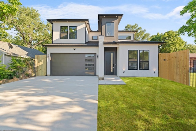 1822 Bickers St, Dallas, TX 75212 - contemporary home featuring a garage, stucco siding, and driveway