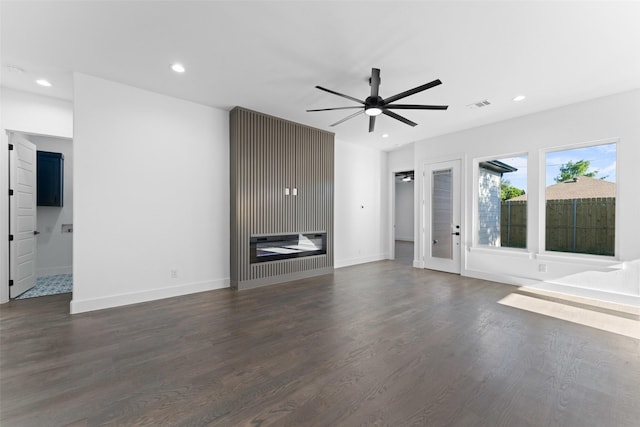 1822 Bickers St, Dallas, TX 75212 - unfurnished living room featuring a ceiling fan, dark wood finished floors, recessed lighting, and baseboards