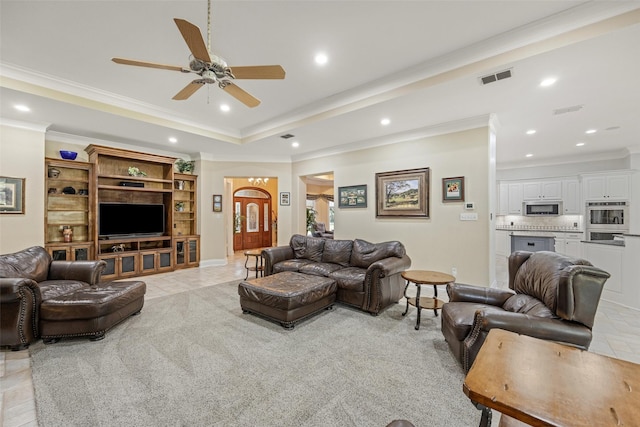 living area featuring ceiling fan, visible vents, recessed lighting, and ornamental molding