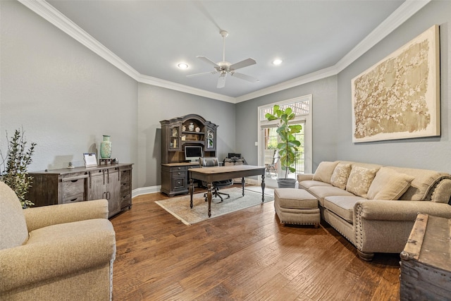 home office with a ceiling fan, wood finished floors, baseboards, ornamental molding, and recessed lighting