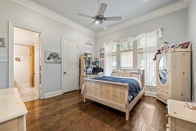 bedroom with a ceiling fan, ensuite bath, crown molding, and dark wood-type flooring