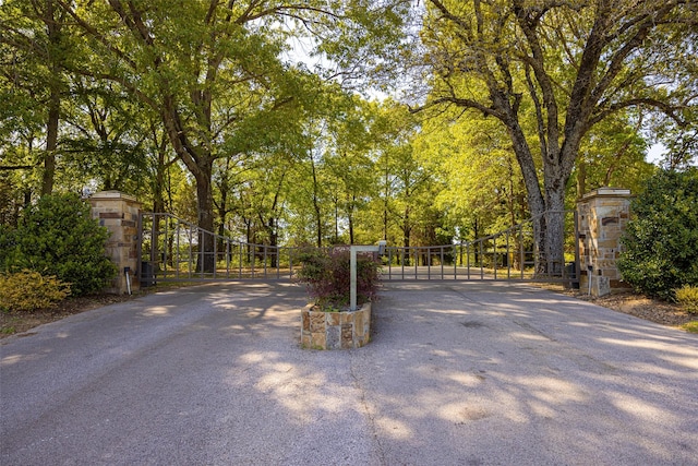 view of street featuring a gate