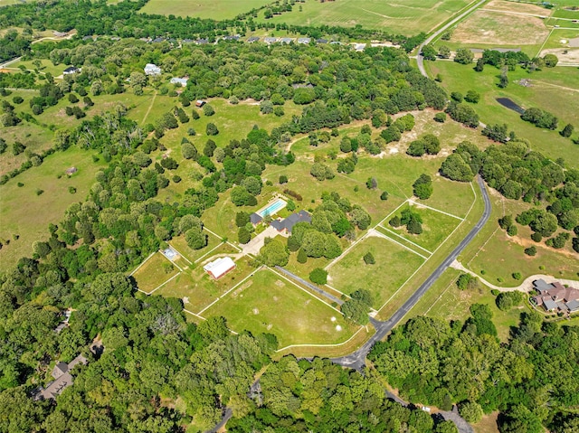 birds eye view of property featuring a rural view