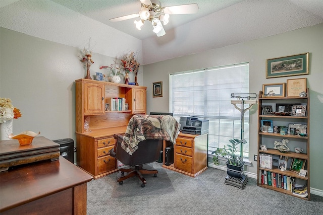 office featuring carpet and ceiling fan