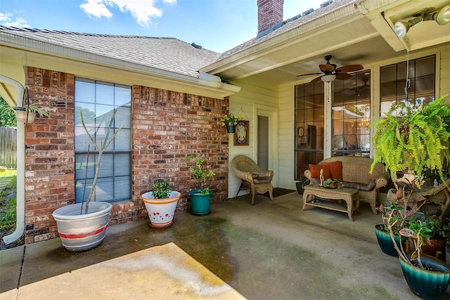 view of patio featuring a ceiling fan