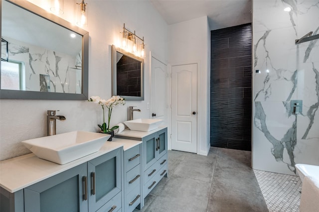 604 Lake Village Dr, Mckinney, TX 75071 - bathroom featuring a marble finish shower and double vanity