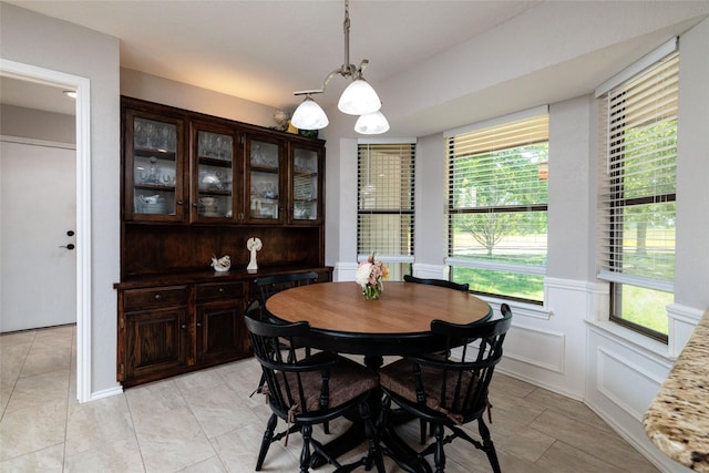 129 Highland Dr, Aledo, TX 76008 - dining space featuring a wainscoted wall