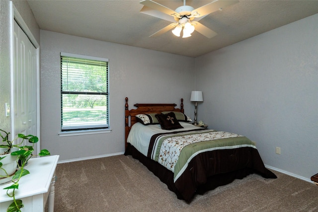 129 Highland Dr, Aledo, TX 76008 - bedroom featuring baseboards, carpet flooring, ceiling fan, and a closet