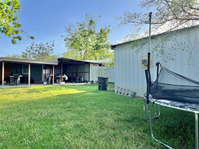 view of yard featuring a trampoline