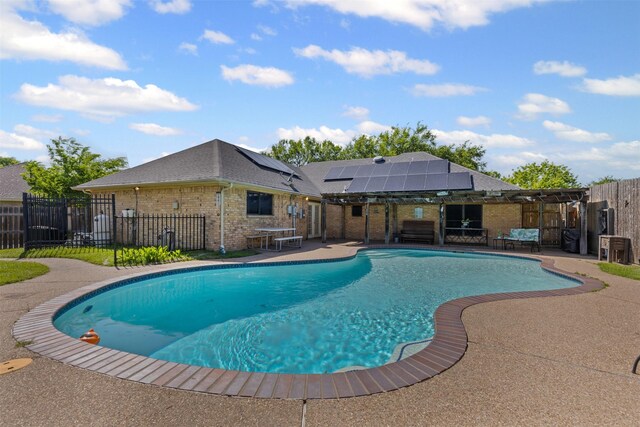 view of swimming pool with a fenced in pool, a patio area, and a fenced backyard