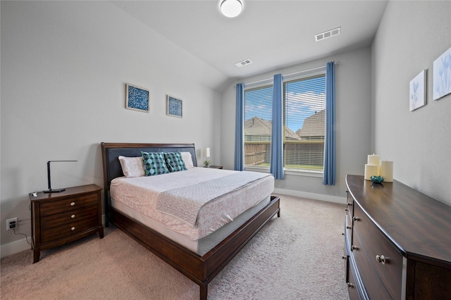 bedroom with baseboards, visible vents, and light colored carpet