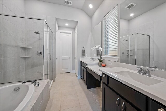 bathroom featuring a shower stall, a sink, and visible vents