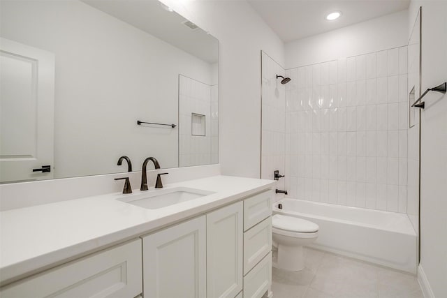 full bath with tile patterned floors,  shower combination, toilet, recessed lighting, and vanity