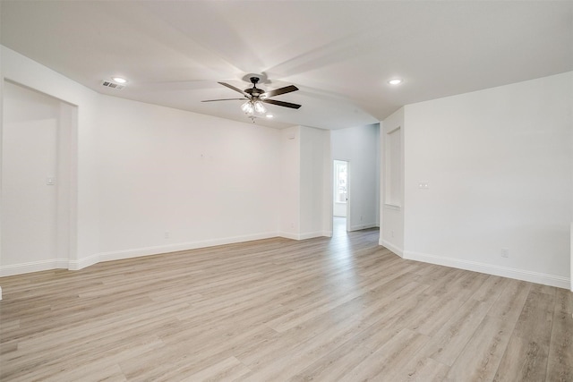 empty room featuring recessed lighting, light wood-style floors, visible vents, and a ceiling fan