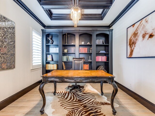 workout area featuring arched walkways, wood finished floors, visible vents, and ornamental molding