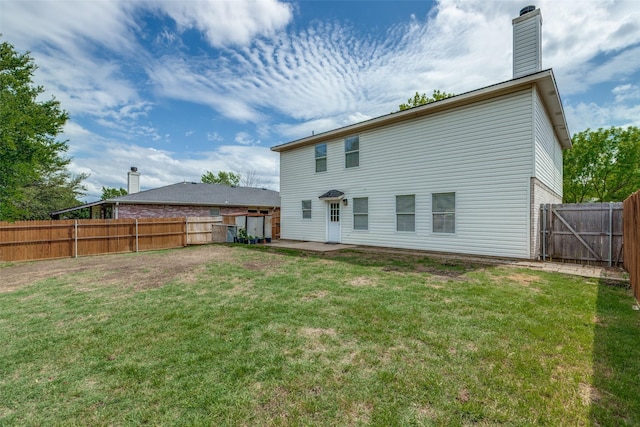 4504 Courtside Dr, Mckinney, TX 75070 - back of house with a patio area and a chimney
